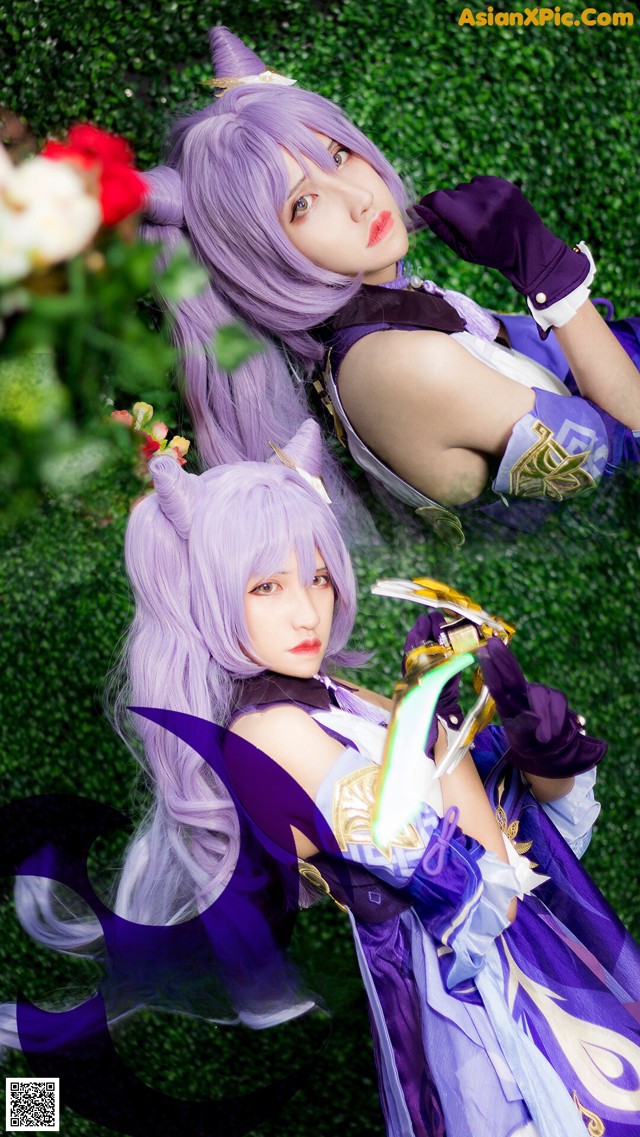 A woman in a purple dress holding a sword in her hand.